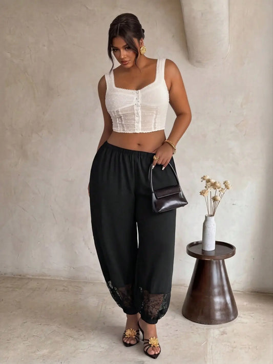 Pantalon femme noir avec dentelle aux chevilles SecretBombe