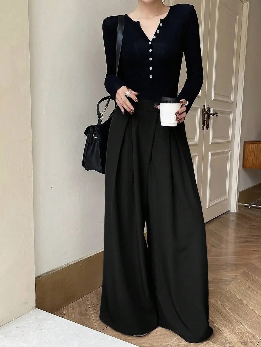 Pantalon femme noir taille haute avec boutons décoratifs SecretBombe