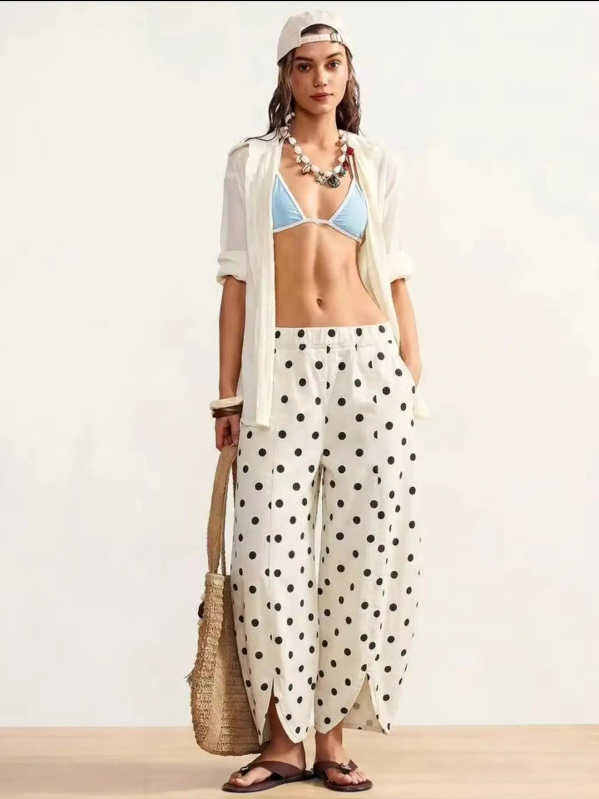 Pantalon large femme blanc à pois noirs SecretBombe