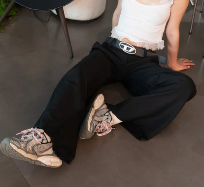 Pantalon large noir SecretBombe tissu lisse et qualitatif