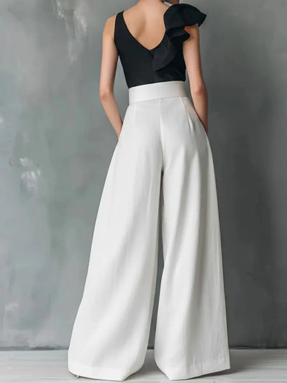 Vue de profil du pantalon palazzo femme blanc SecretBombe