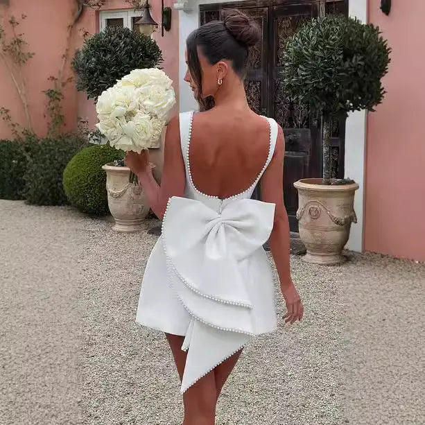 Robe femme blanche chic sans manches style moderne SecretBombe