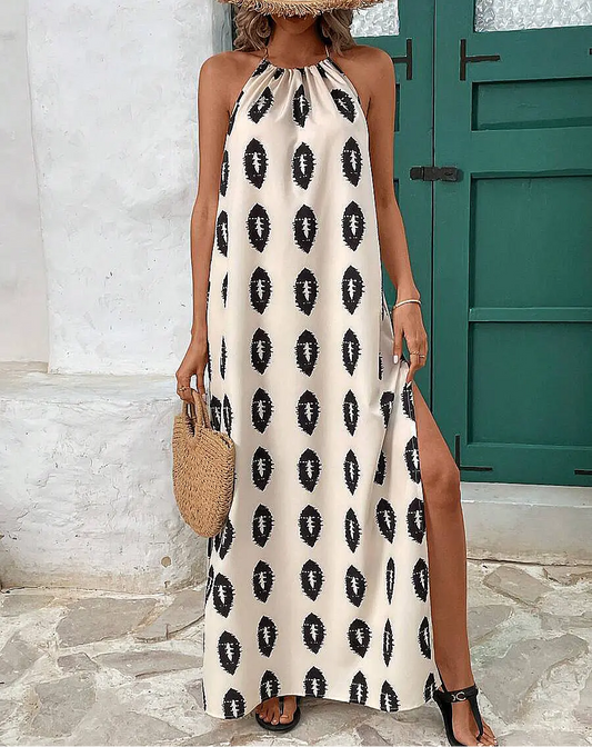 Robe longue bohème d’été imprimé vert, sans manches avec dos ouvert et liens à nouer au cou.