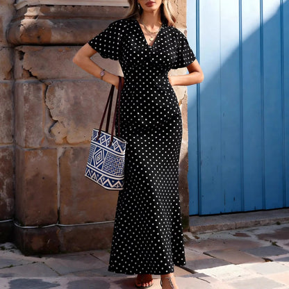 Robe longue noire à pois blancs élégante avec manches courtes