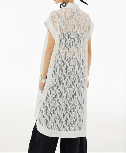 Robe tunique fluide blanche pour femme, coupe ample et élégante, sans manches