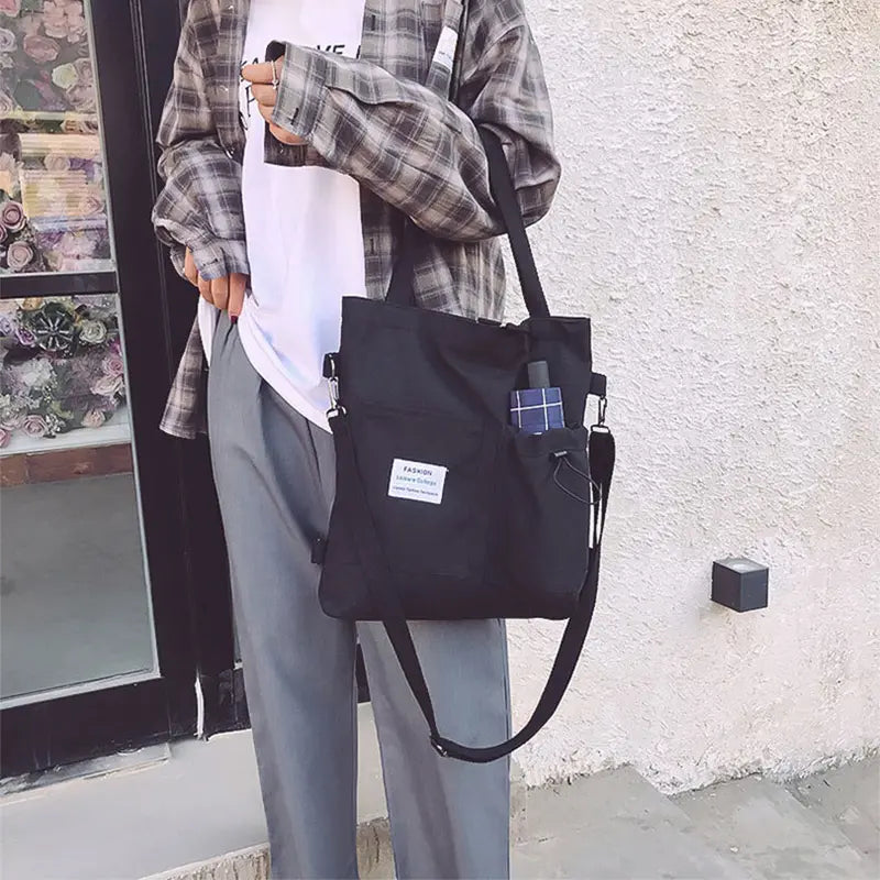 Sac à dos femme en toile couleur noir, design élégant et pratique