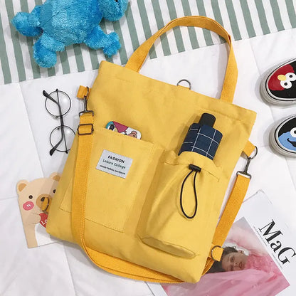 Sac à dos femme en toile couleur jaune, poches fonctionnelles et bretelles réglables