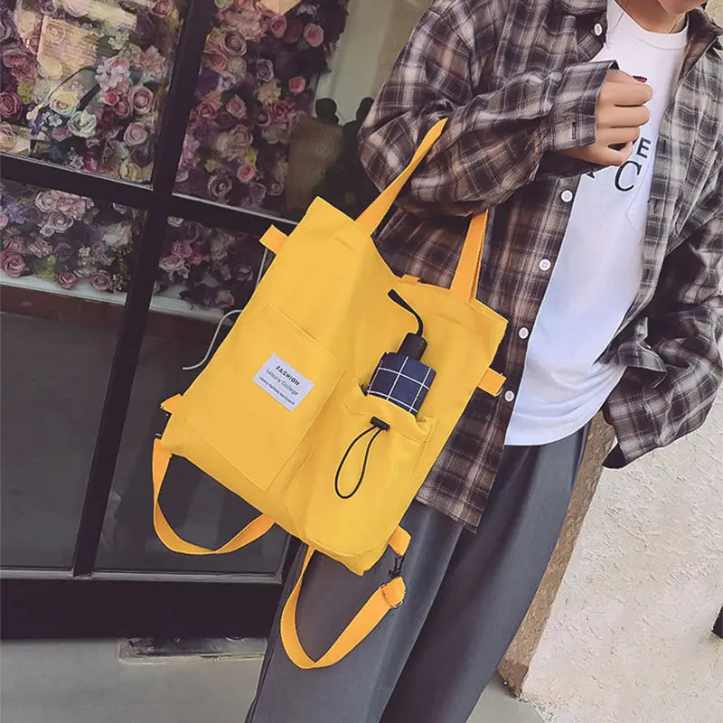 Sac à dos femme convertible en tote bag, toile jaune, pratique pour sorties et travail