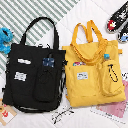 Sac à dos femme convertible en tote bag, toile noire, parfait pour le quotidien
