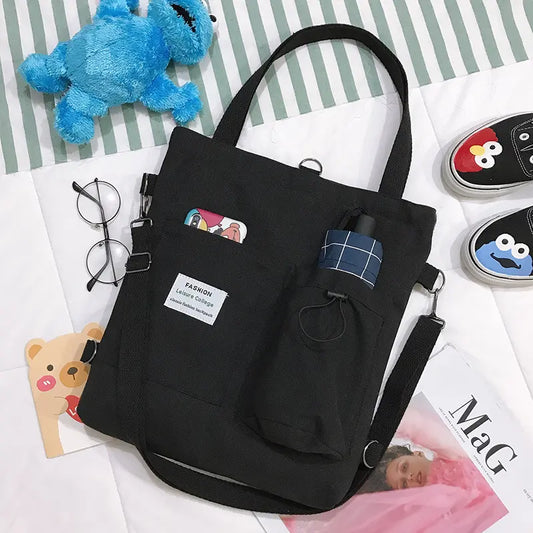 Sac à dos femme en toile couleur noir, design élégant et pratique