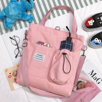 Sac à dos femme convertible en tote bag, toile rose, design moderne et tendance