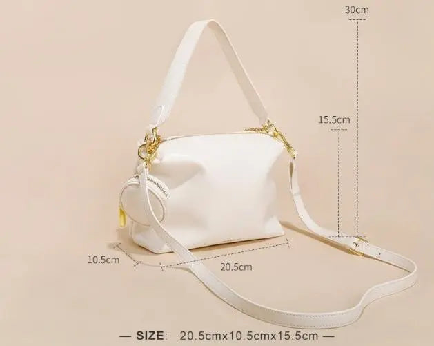 "Sac en cuir véritable beige, élégant et pratique pour la vie urbaine"