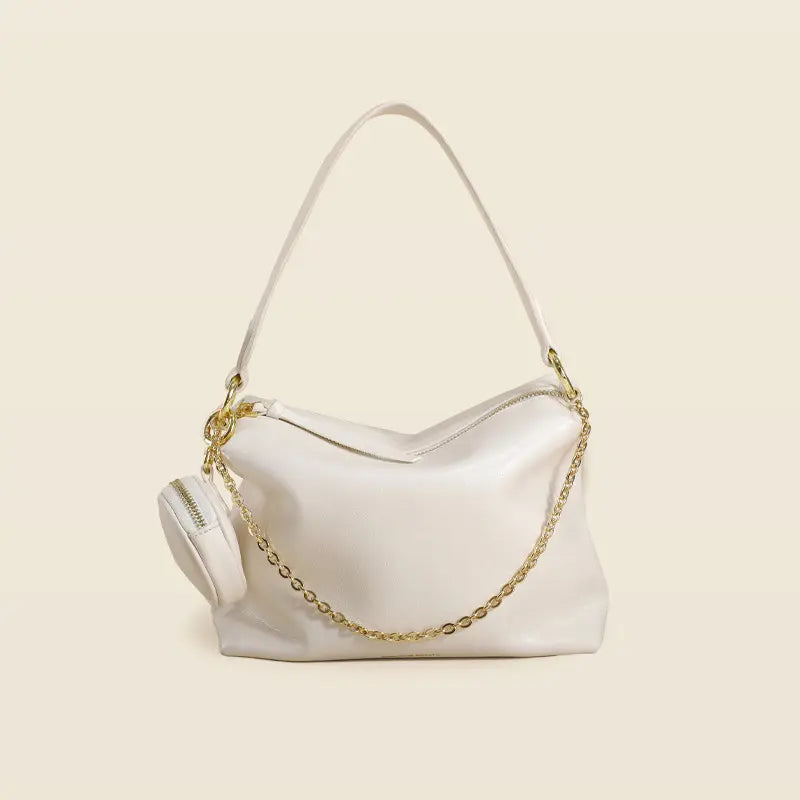 "Sac en cuir véritable beige, élégant et pratique pour la vie urbaine"