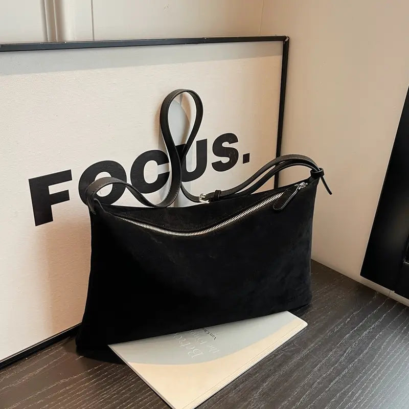 Sac en daim avec compartiment intérieur pour téléphone et essentiels
