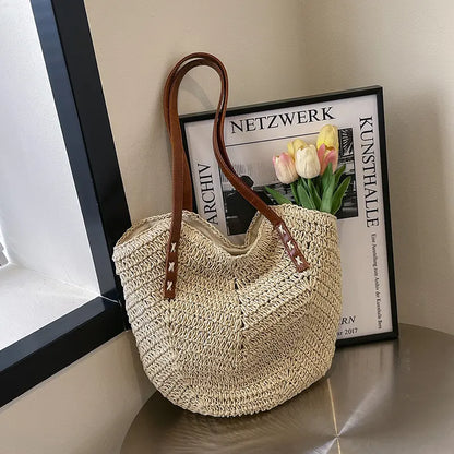 Sac femme porté main beige spacieux et souple, parfait pour sorties et shopping
