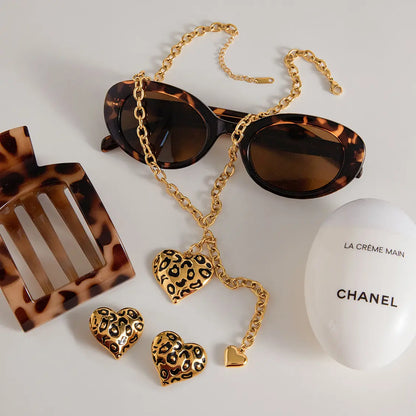 Parure femme collier et boucles d’oreilles cœur doré tendance chic SecretBombe