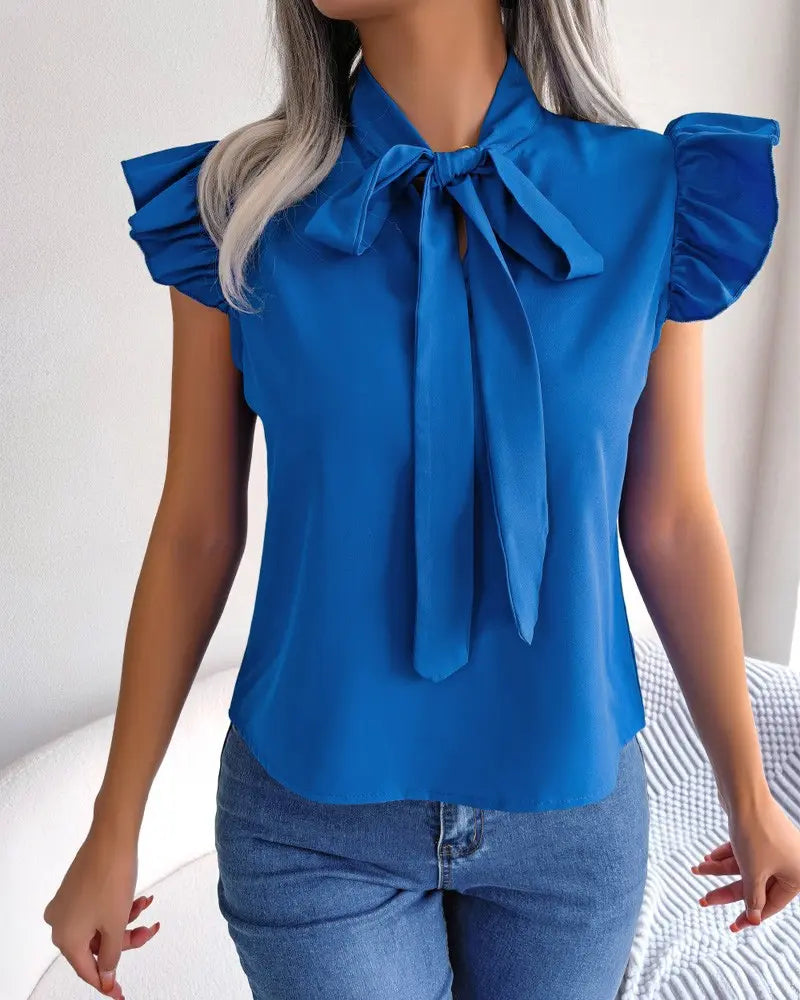 Chemisier femme bleu à col lavallière avec manches volantées SecretBombe