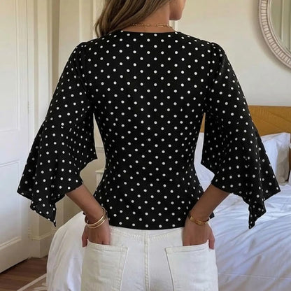 Vue de dos de la blouse noire à pois blancs SecretBombe