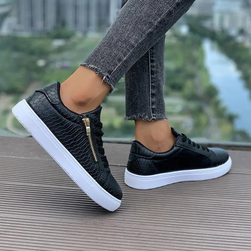 SecretBombe sneakers noires femme avec zip latéral doré design élégant et moderne