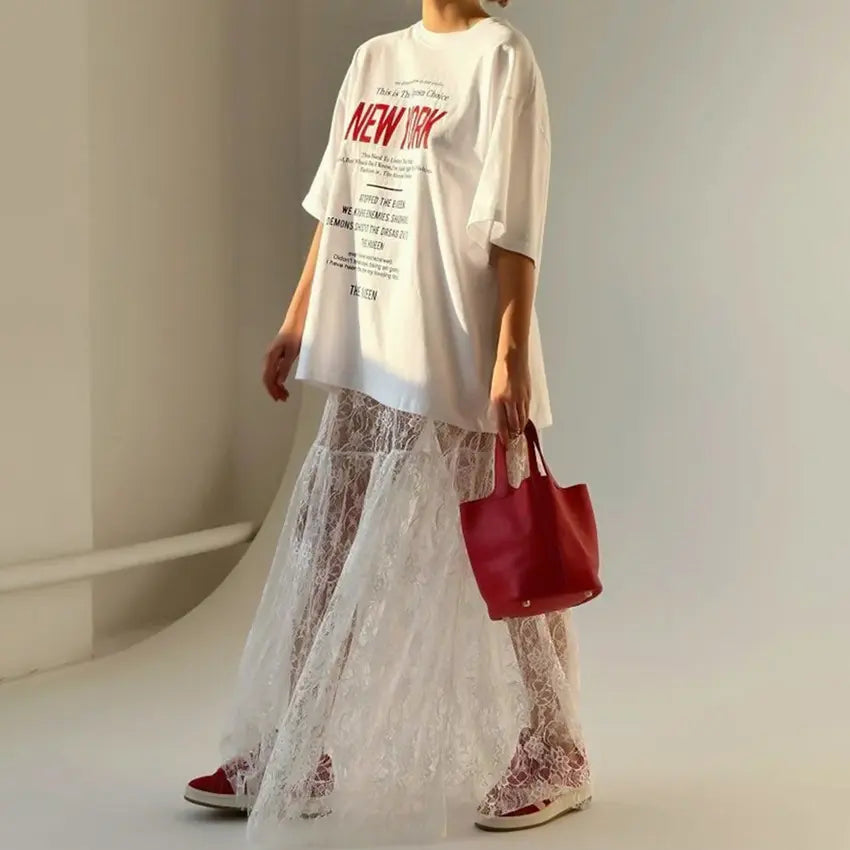 Jupe longue transparente en dentelle blanche idéale pour un style estival raffiné - SecretBombe