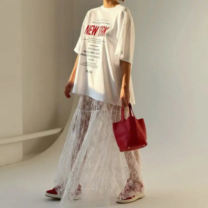 Jupe longue transparente en dentelle blanche idéale pour un style estival raffiné - SecretBombe