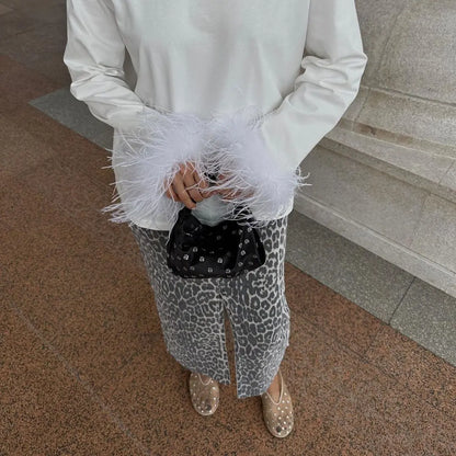Jupe léopard femme portée avec pull blanc SecretBombe