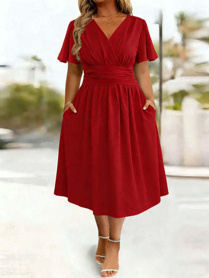 Robe rouge élégante SecretBombe cintrée à la taille avec jupe évasée