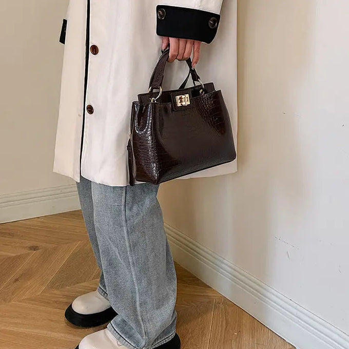 SecretBombe sac bandoulière marron détail couture élégante