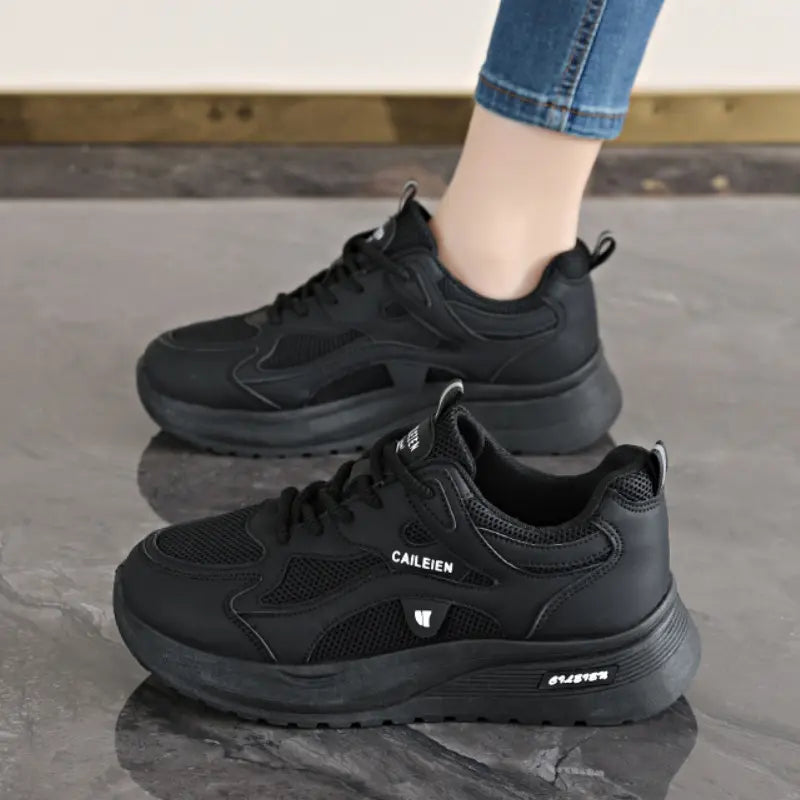 SecretBombe sneakers femme noires avec semelle épaisse style moderne