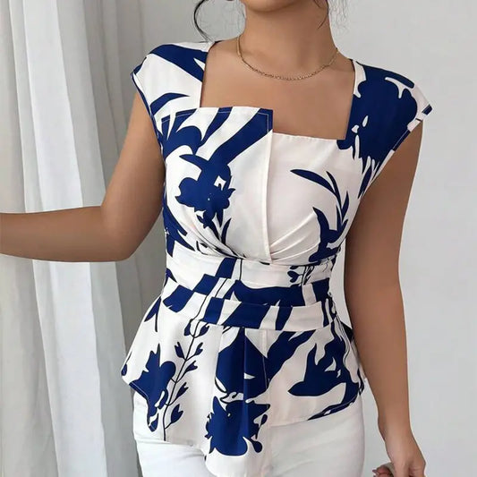 : Top femme imprimé feuilles blanc et bleu marine coupe cintrée élégante style bureau chic SecretBombe