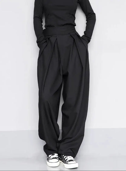 Pantalon large en polyester noir pour femme SecretBombe, coupe ample et taille haute, style minimaliste et moderne