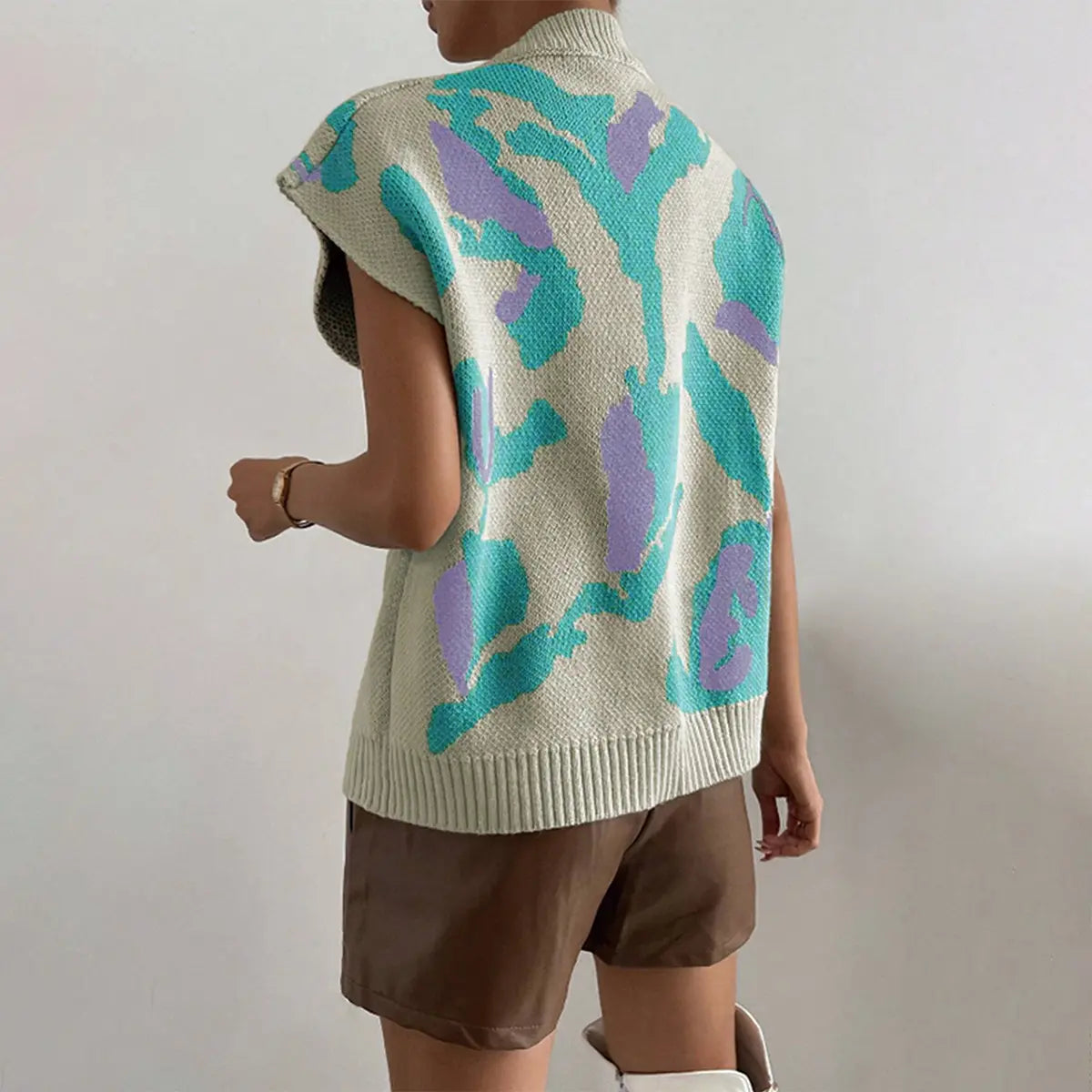 Pull sans manches fond beige à motifs floraux SecretBombe, coupe décontractée