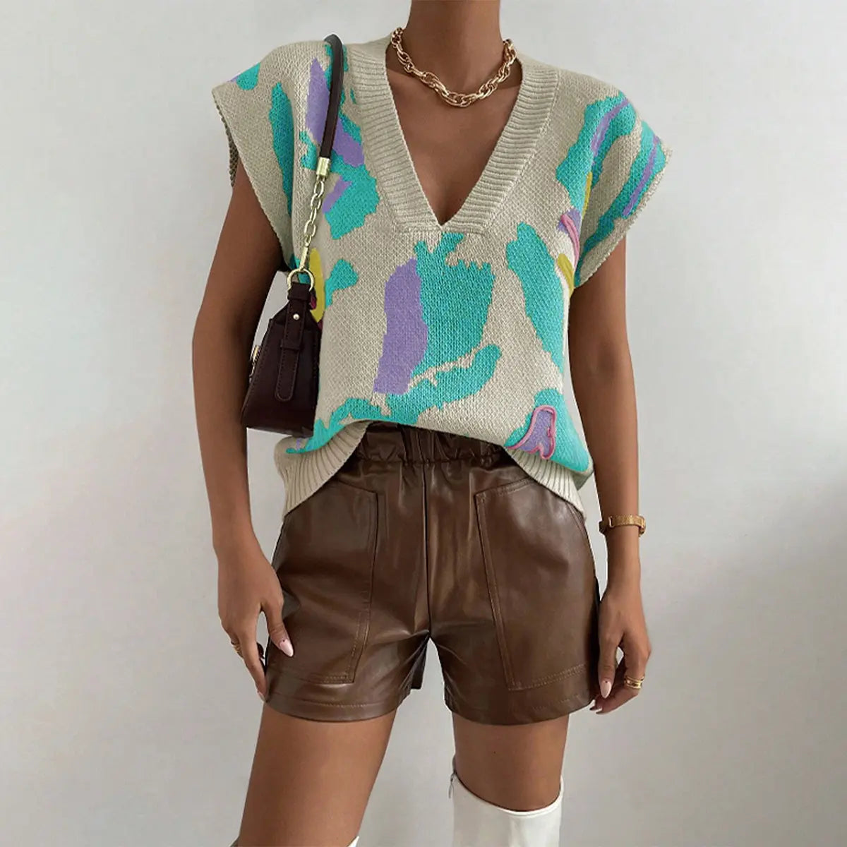 Pull col V sans manches SecretBombe, motif floral coloré tendance