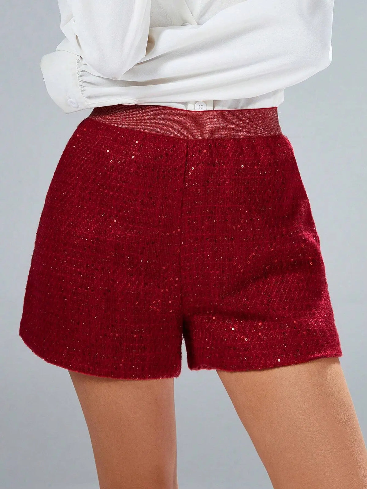 Vue de profil du short femme rouge à paillettes SecretBombe