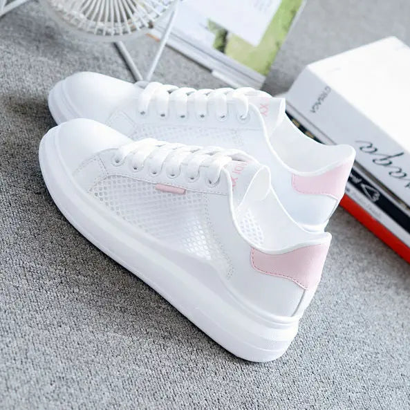 Sneakers plateforme blanches femme pour une allure élégante.