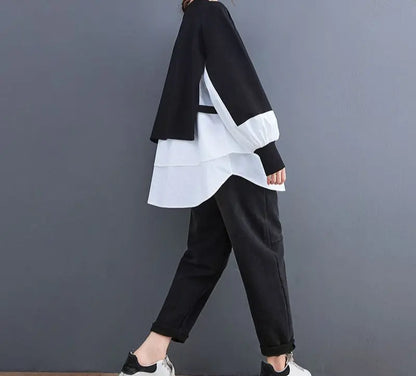 Sweat bicolore effet deux pièces superposées, style oversize loose, look audacieux et confortable, manches longues