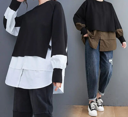 Sweat bicolore oversize noir et blanc, coupe loose ample, effet deux pièces superposées, manches longues froncées