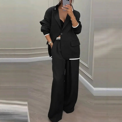 Ensemble tailleur femme noir avec veste à poches et pantalon large SecretBombe