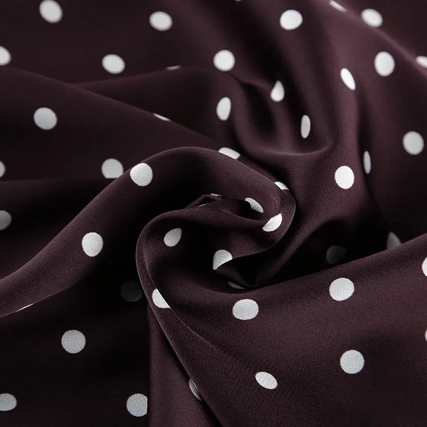 Détail du tissu marron à pois blancs de la jupe femme SecretBombe