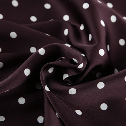 Détail du tissu marron à pois blancs de la jupe femme SecretBombe