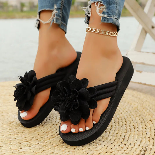 Tongs femme noires avec semelle souple et légère