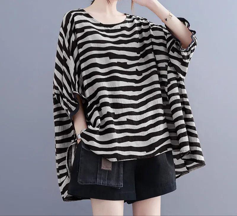 Top ample à rayures noires style rétro chic pour femme grande taille