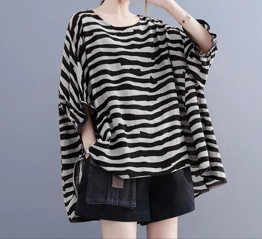 Top ample à rayures noires style rétro chic pour femme grande taille