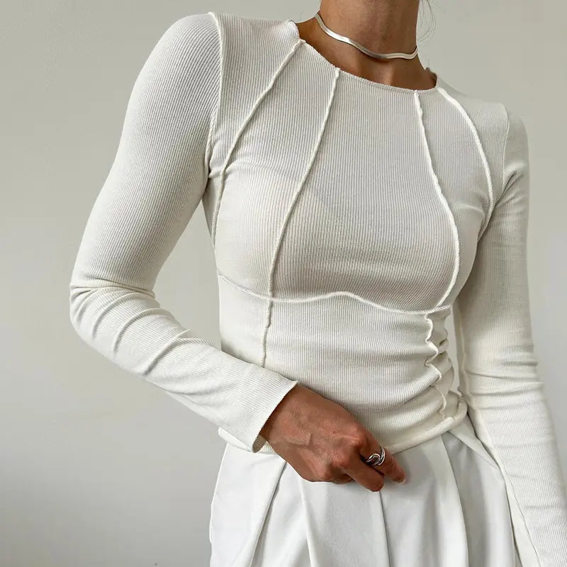 Top femme blanc manches longues chic et ajusté