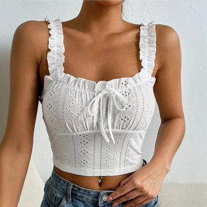 Top crop blanc femme à broderie anglaise, effet corset, fines bretelles volantées