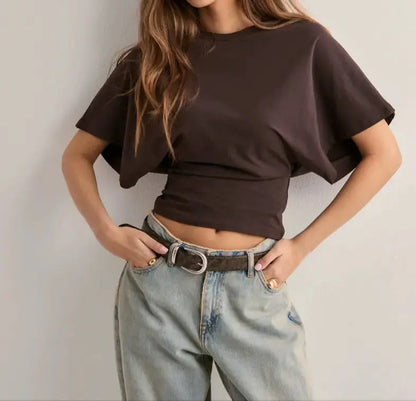 Top femme moderne streetwear, coupe cintrée et ample, manches courtes type chauve-souris, coloris tendance, tissu polyester léger