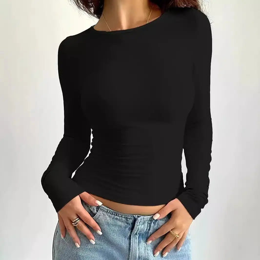Top femme noir à manches longues, coupe slim fit élégante et confortable