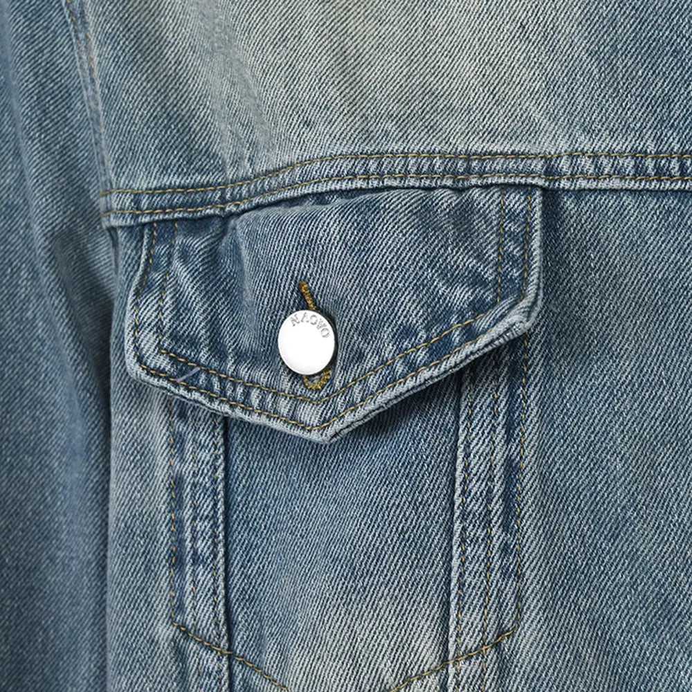 détails poches veste oversize denim